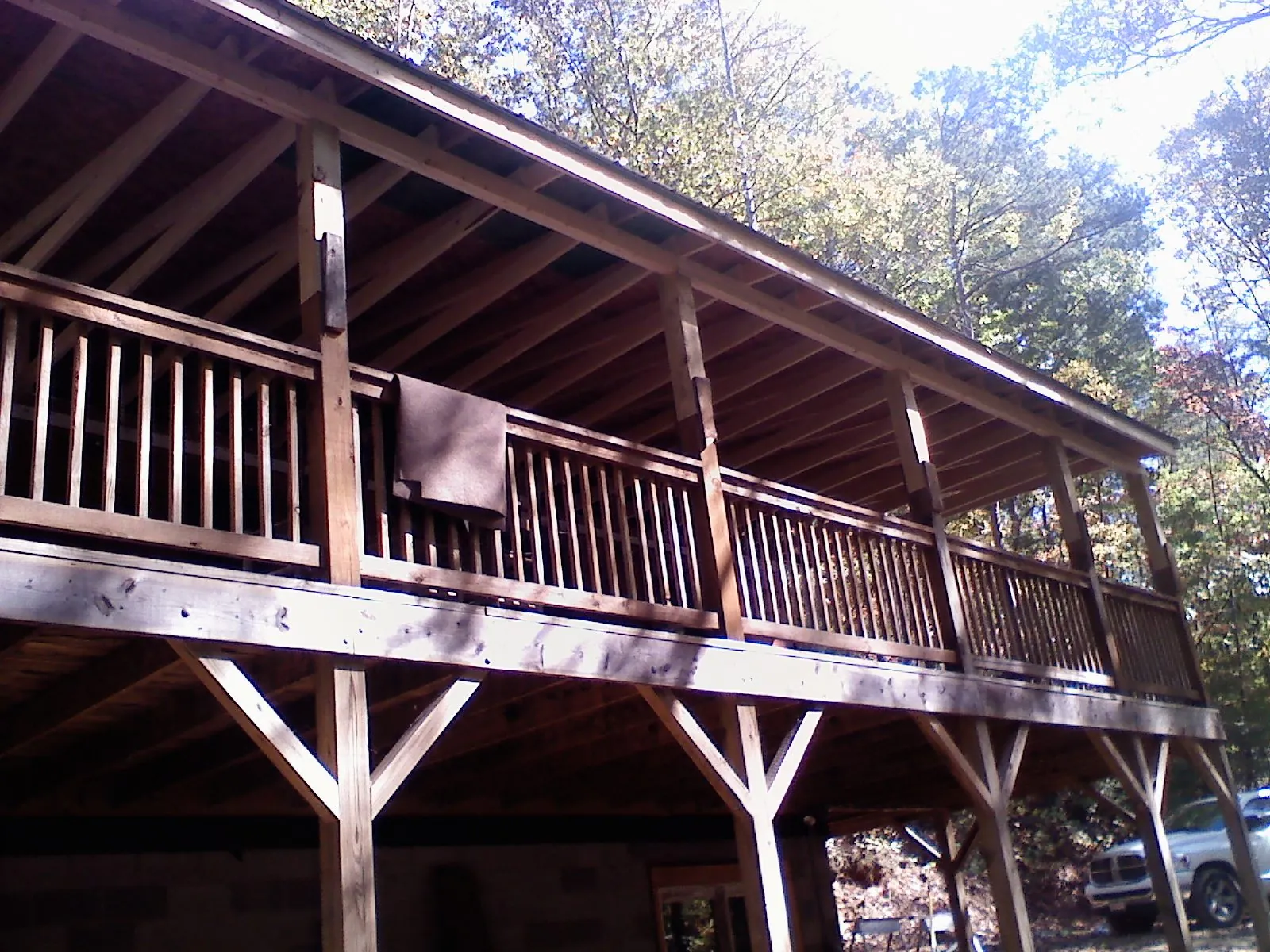 Timber framing under a new elevated porch and deck — Roof Leak Repair in Pittsfield by Roofing Brothers
